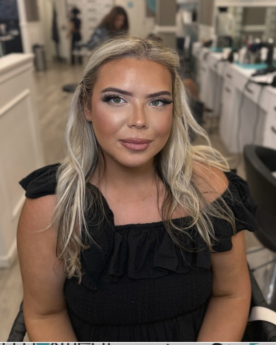 Moxie guest with beach waves and glam